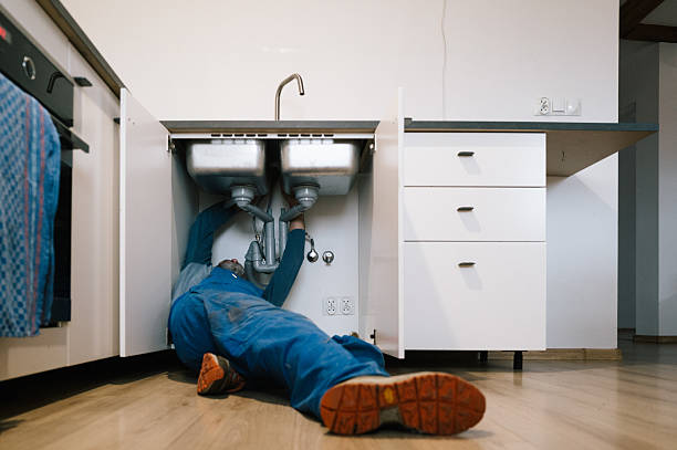 Professional Drain Cleaning technician working in Charleston, MS